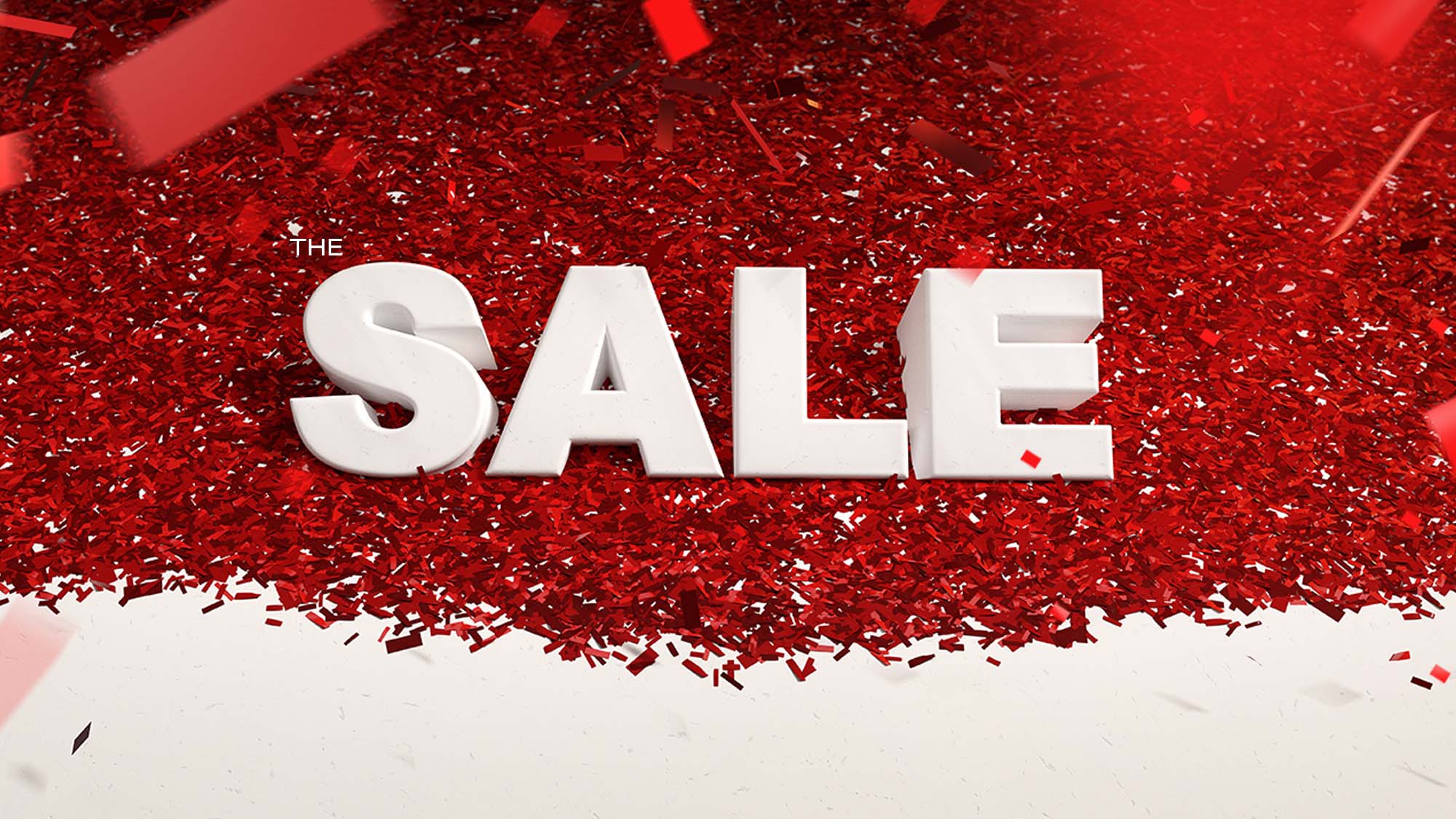 The image features large white text 'THE SALE' on a red confetti background.